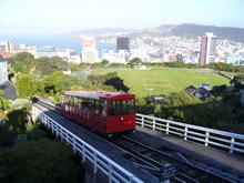 Cable Car heading up from the city with the Harbour in the background