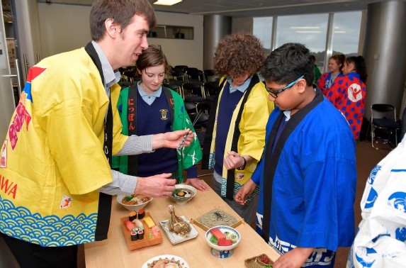 JICC staff member Chris showcasing some amazing Japanese food