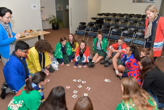 The students enjoy a game of karuta